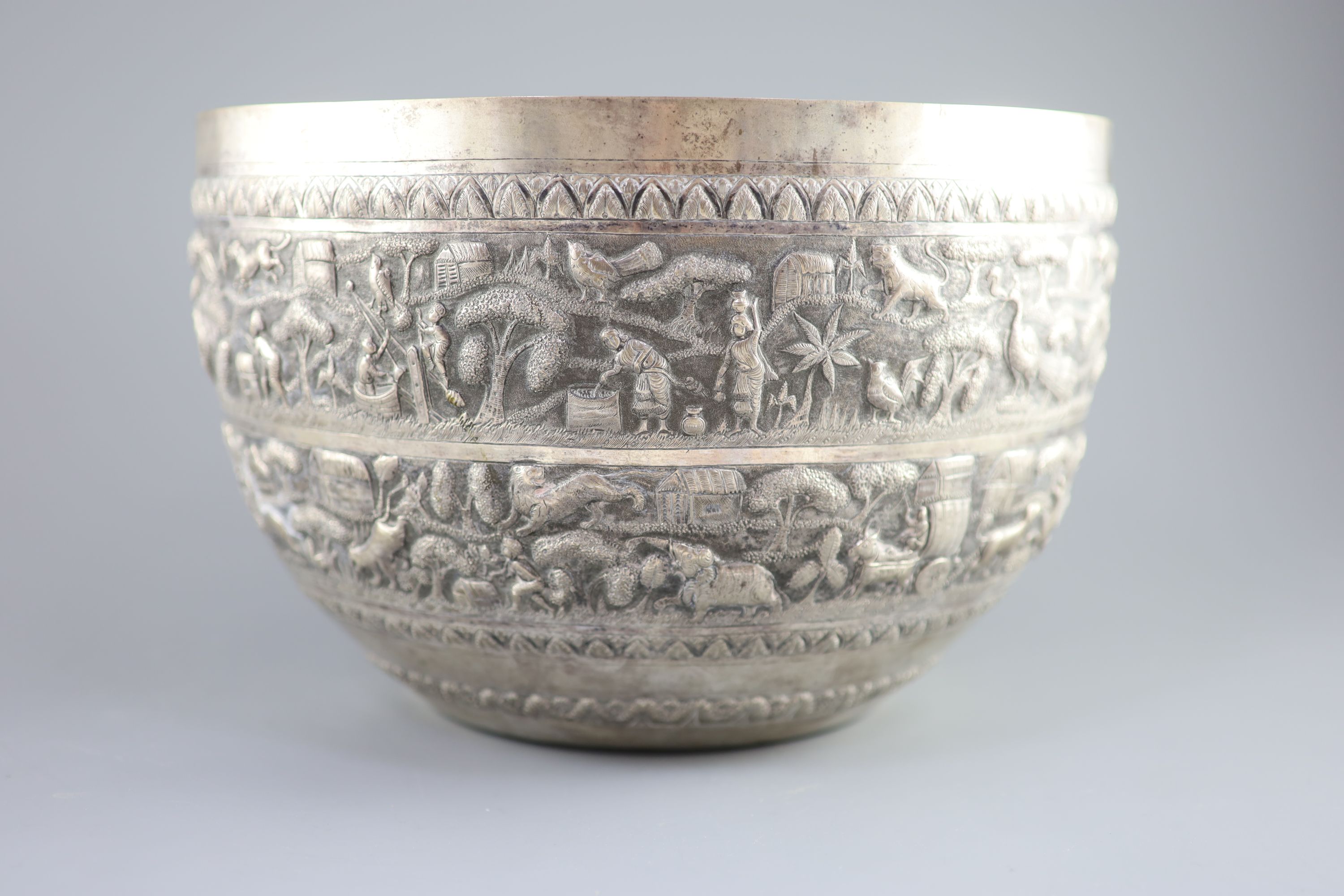 A large late 19th century Indian export embossed silver bowl, diameter 31.2cm, height 20.1cm, 36oz.